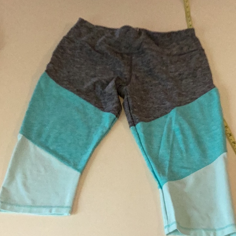 Athletic works capri work out wear silver, teals.  Size large 12-14